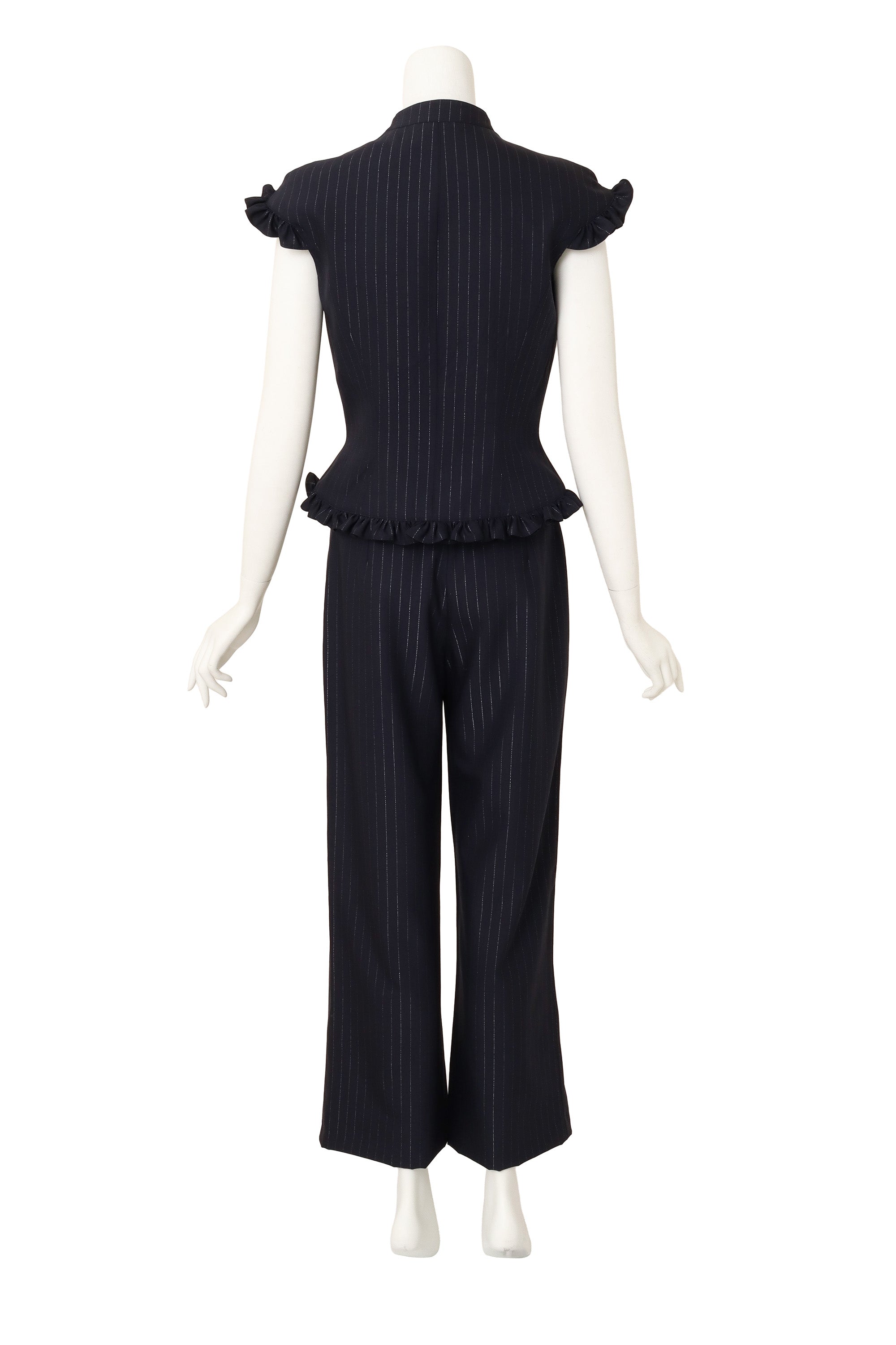 ruffle suit set by Mugler on mannequin back @ Recess LA
