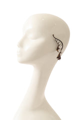 Bronze flower cuff crystal earrings by Nadir on mannequin @ Recess LA 