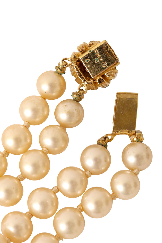 Double strand faux pearl necklace with jeweled drop pendant by Ciner closure backside @ Recess LA