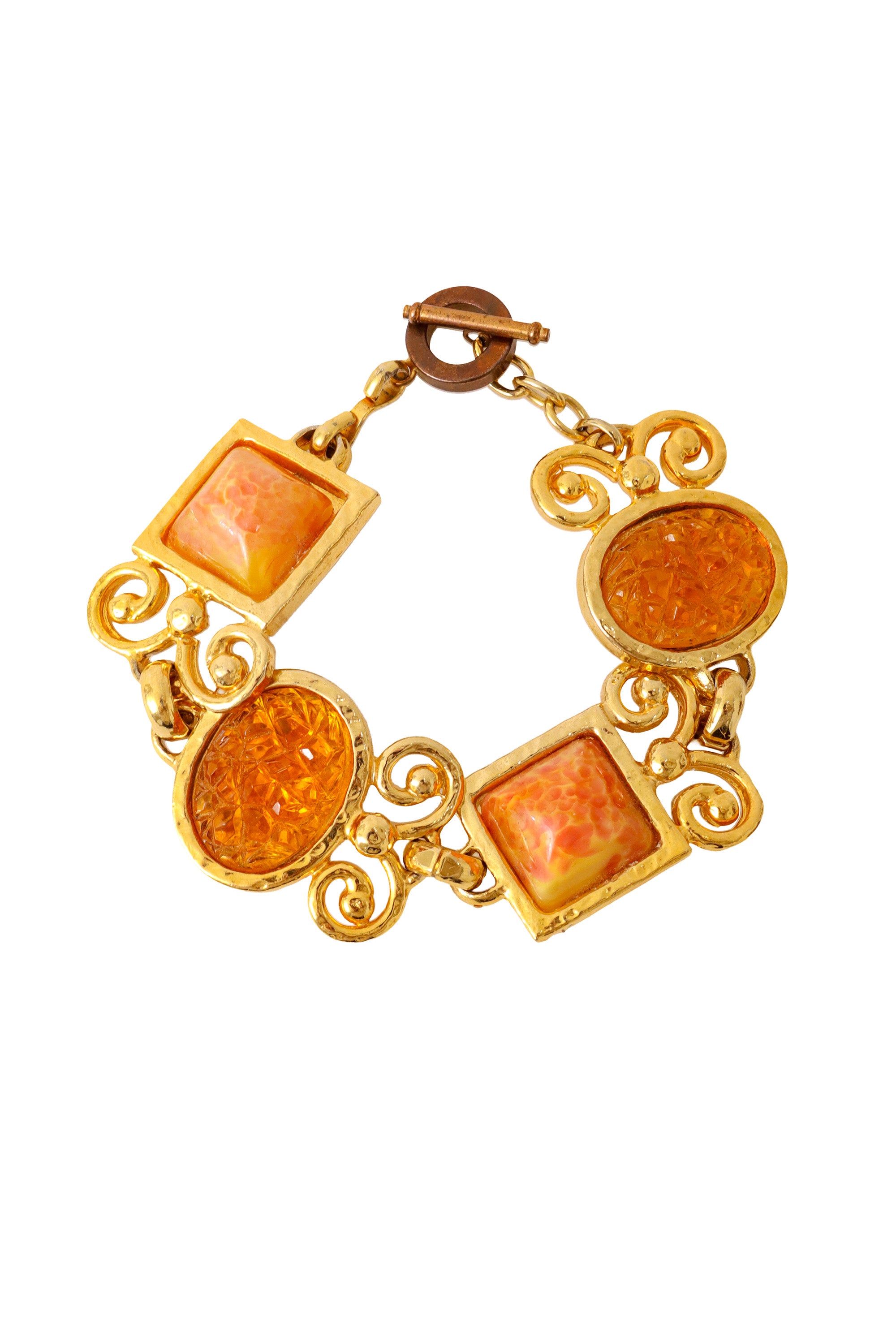 Ornate link bracelet with textured amber-tone glass panels and gold scrollwork by Shadow Paris @ Recess LA 
