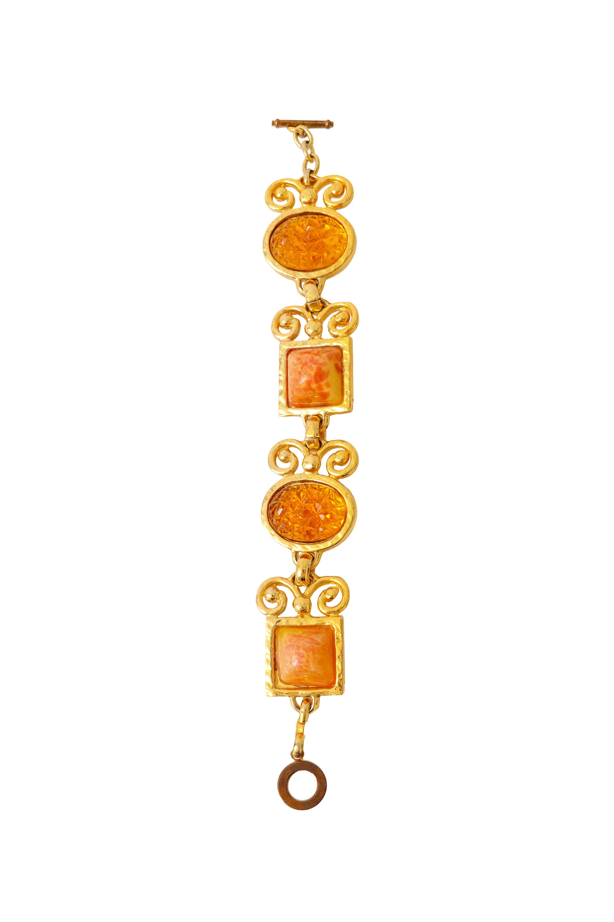 Ornate link bracelet with textured amber-tone glass panels and gold scrollwork by Shadow Paris open vertical @ Recess LA 