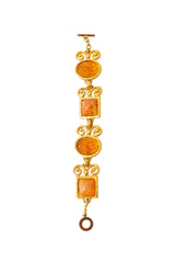 Ornate link bracelet with textured amber-tone glass panels and gold scrollwork by Shadow Paris open vertical @ Recess LA 