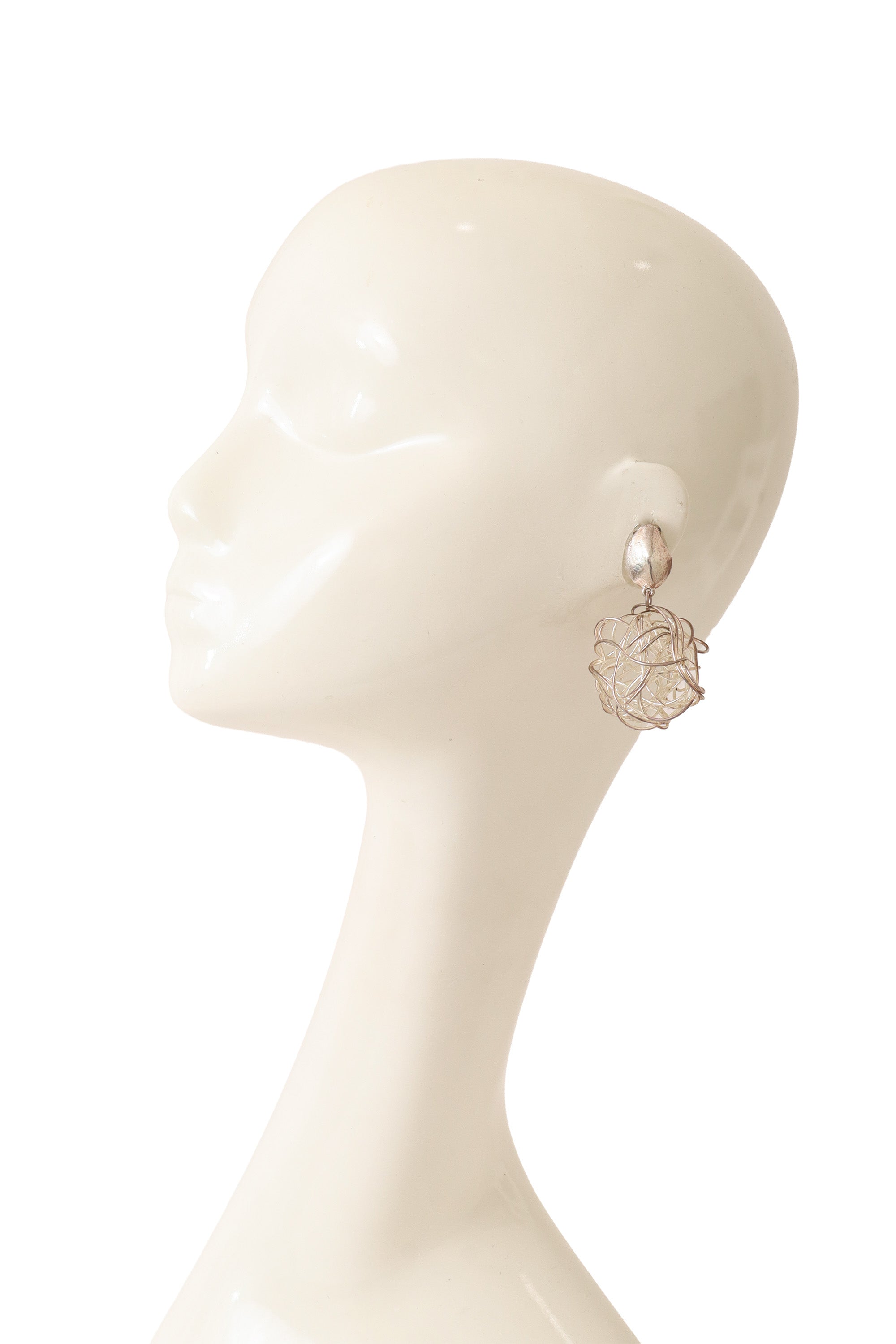 wire drop earrings by Cécile Jeanne on mannequin @ Recess LA