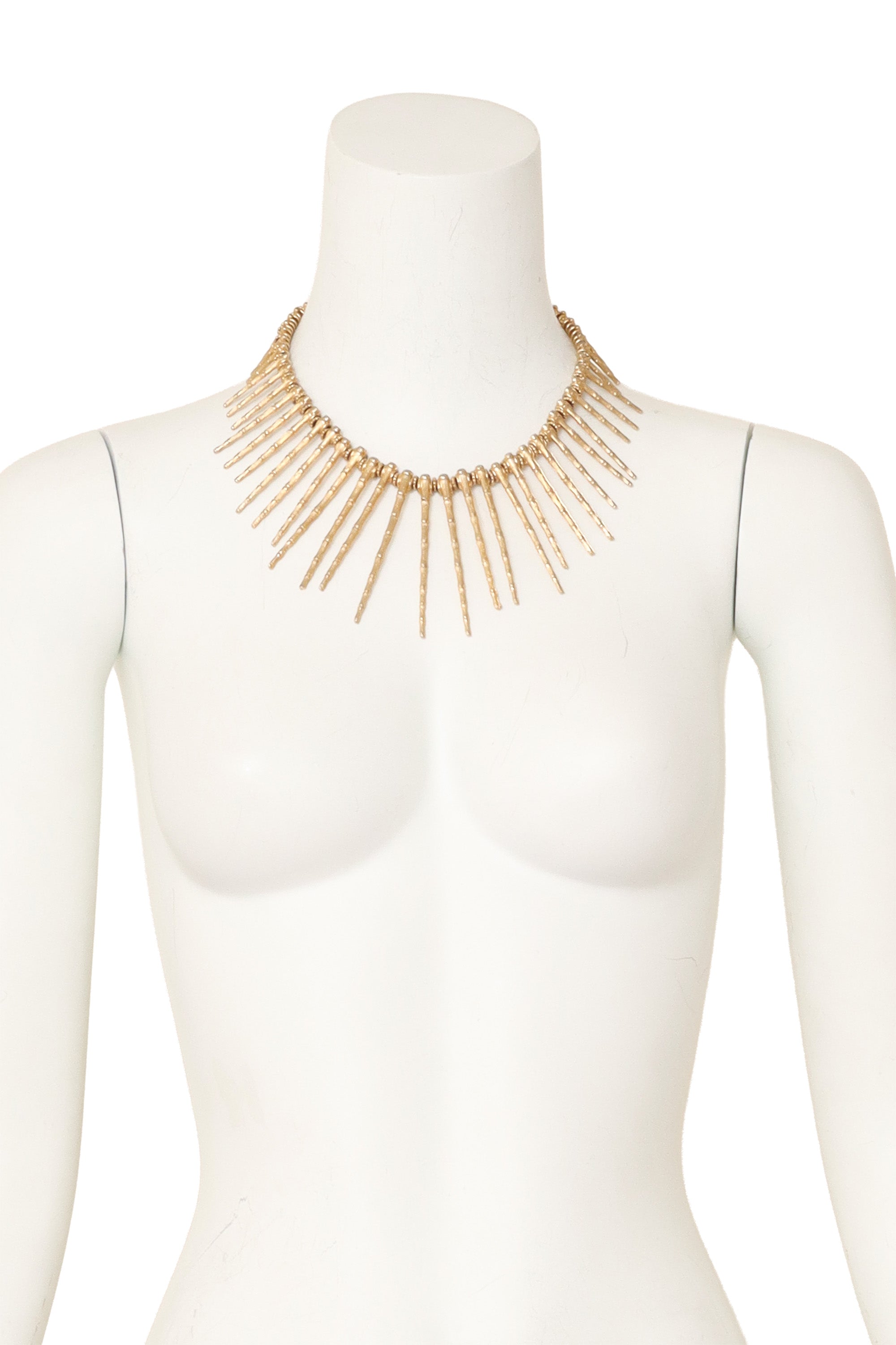 Textured bamboo-inspired spike collar necklace in gold tone metal on mannequin @ Recess LA 