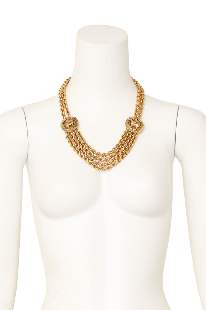 Sagittarius coin gold-tone quad chain necklace by Chanel on mannequin @ Recess LA 