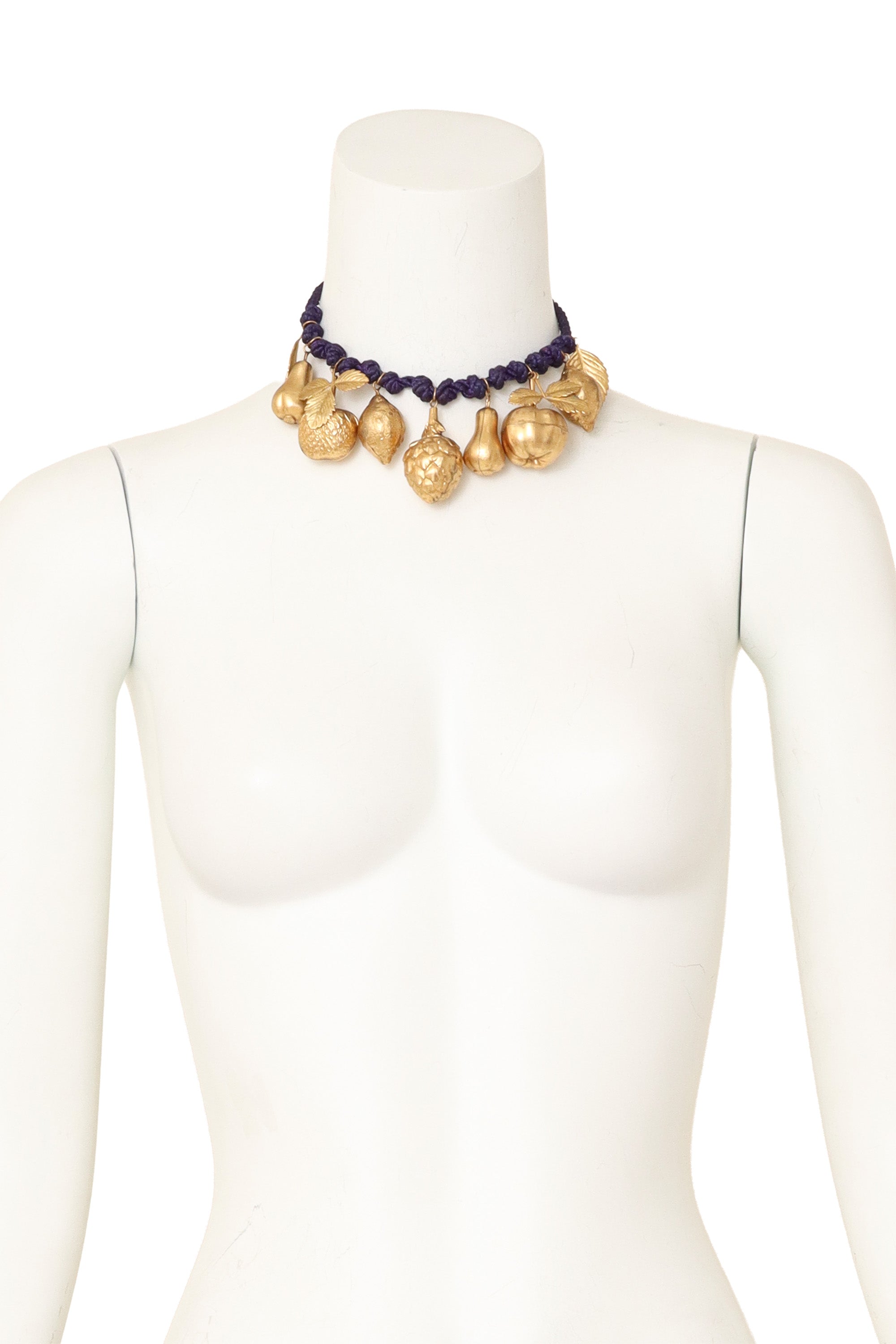 Gilded fruit charm necklace on mannequin @ Recess LA
