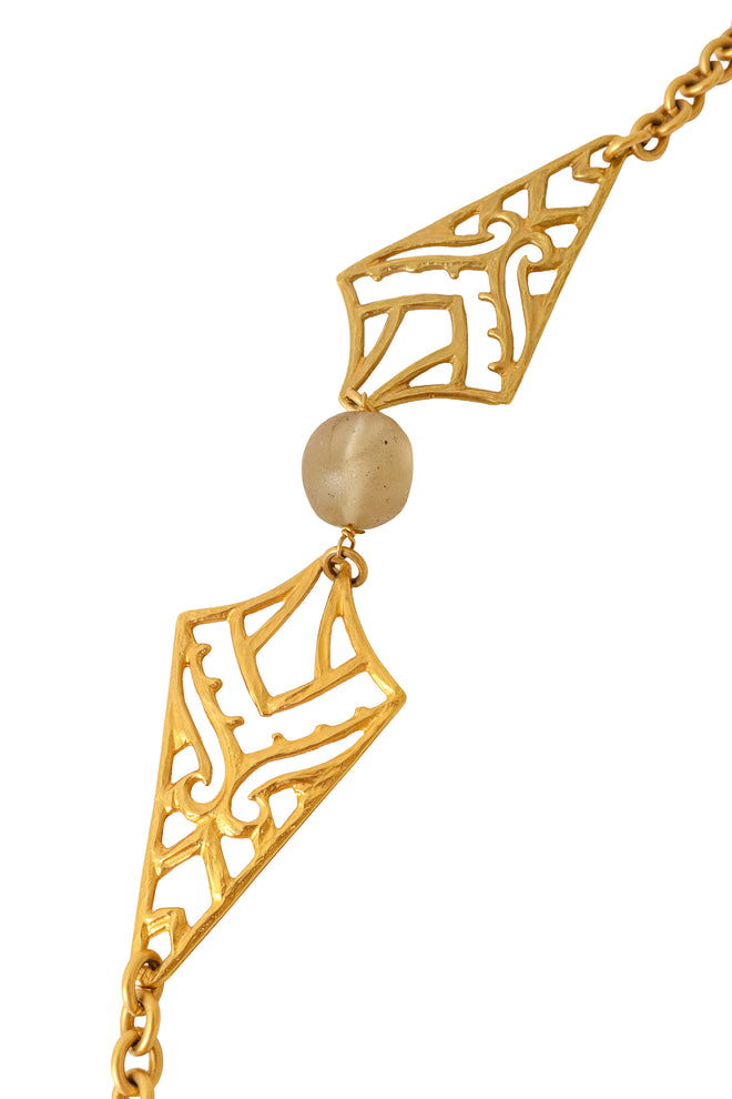 Filigree panel drop necklace with geometric openwork details beads up close @ Recess LA 