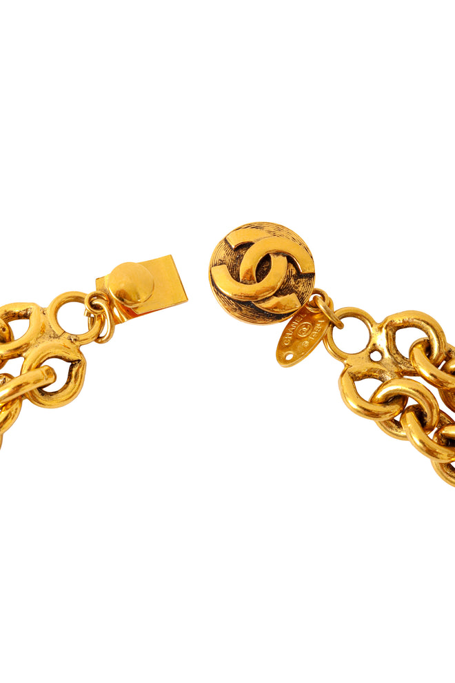 Sagittarius coin gold-tone quad chain necklace by Chanel closure and signature @ Recess LA 