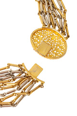 Multi-strand chain necklace with mixed metal links and filigree detailing back closure open @ Recess LA 