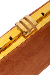 Quilted suede frame bag clasp @ Recess LA