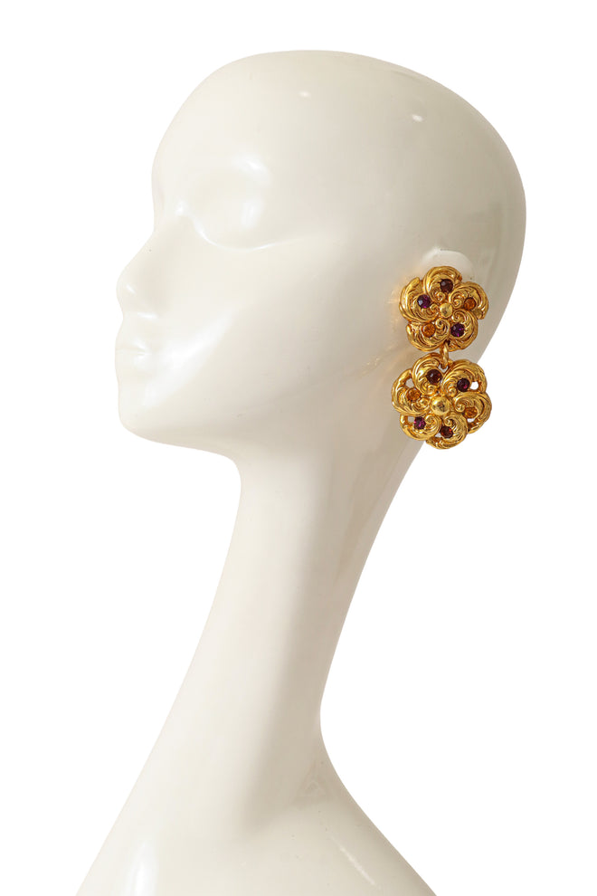 Ornate floral drop earrings with multicolor crystals and sculpted gold detailing by F. Volle on mannequin @ Recess LA 