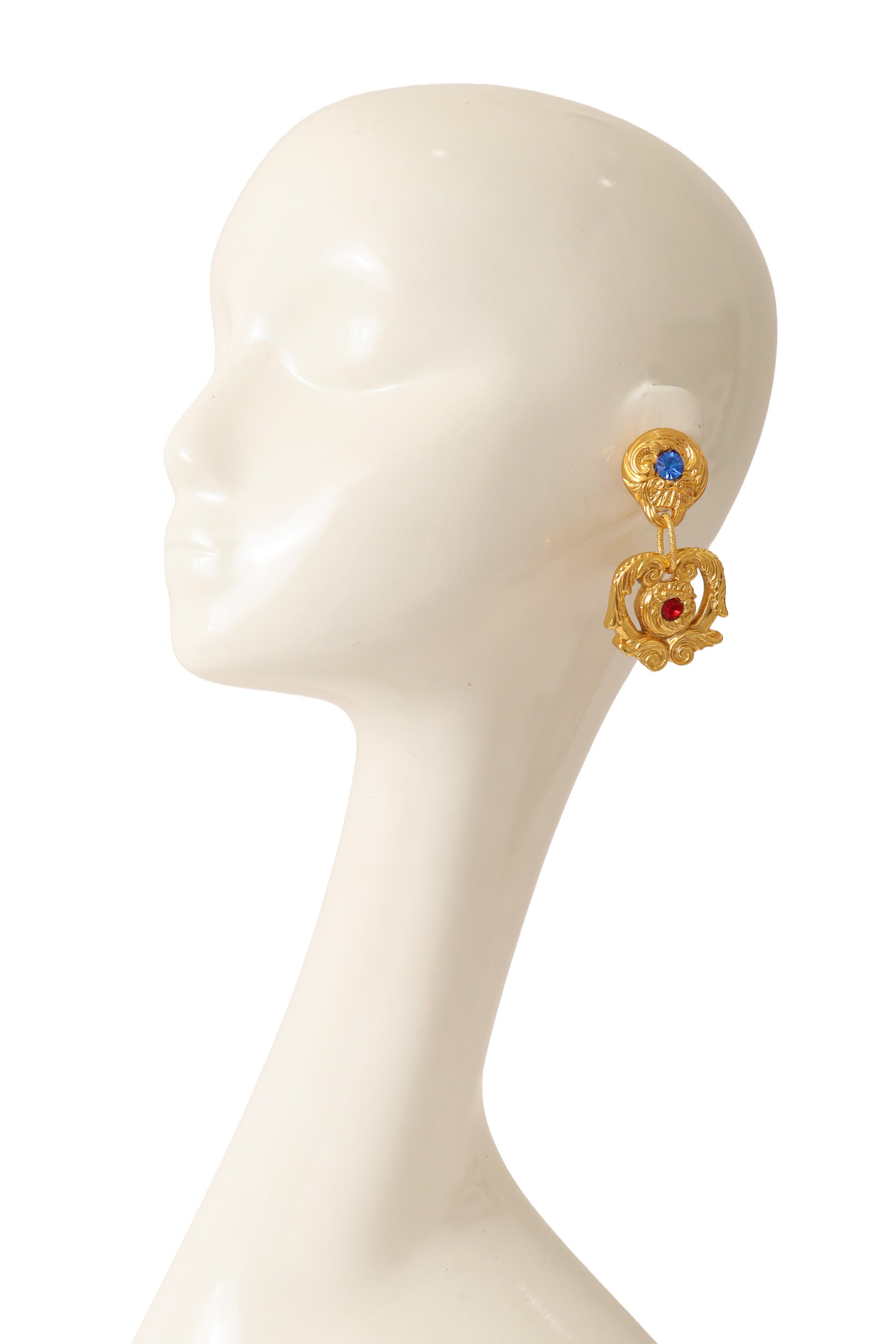 Scroll drop earrings by F. Volle on mannequin head @ Recess LA