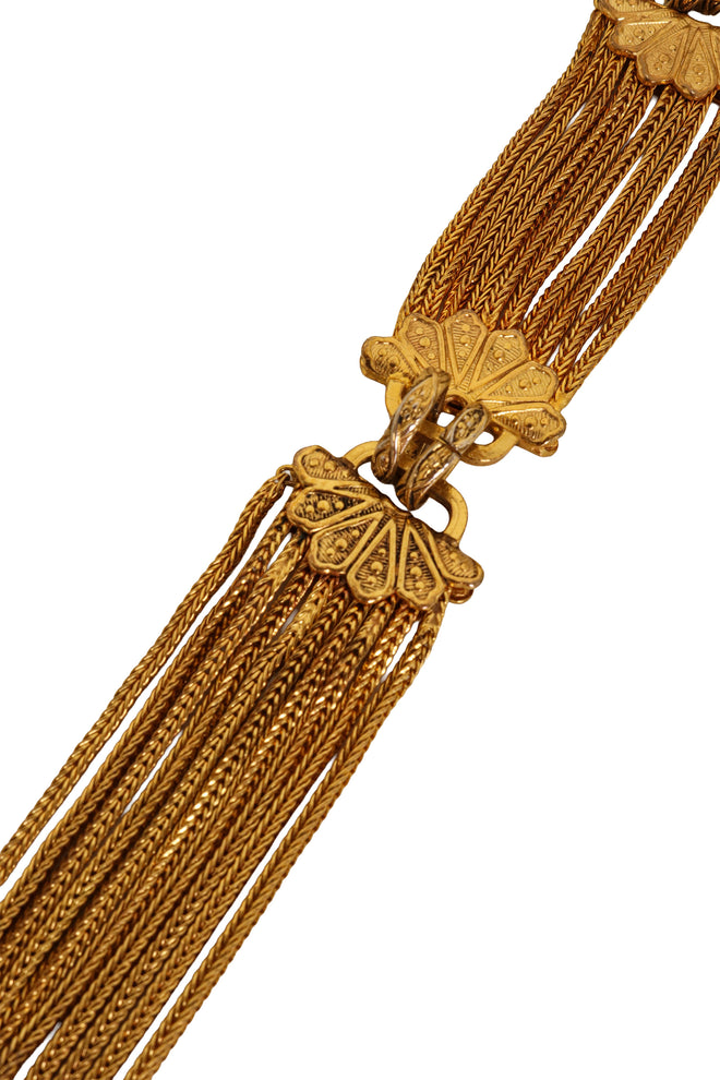 Multi-Chain Pearl Medallion Belt by Chanel close-up of a ornate decorative clasps tarnishing @ Recess LA