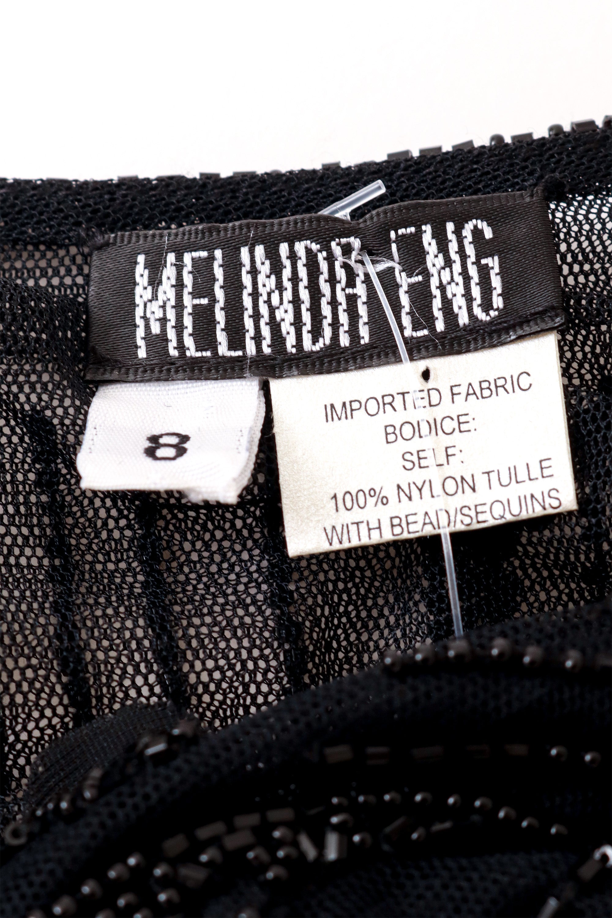  shrug jacket by Melinda Eng on mannequin label @ Recess LA