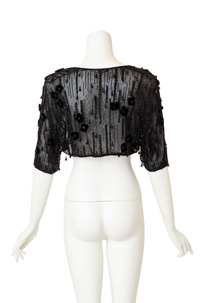  shrug jacket by Melinda Eng on mannequin back @ Recess LA