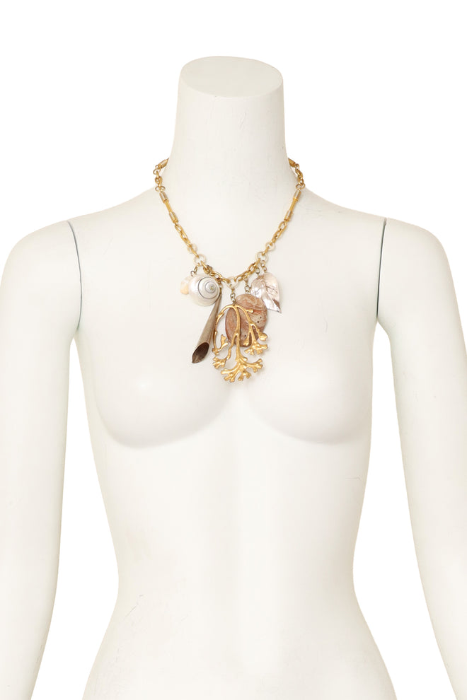 Organic shell cluster necklace on mannequin @ Recess LA