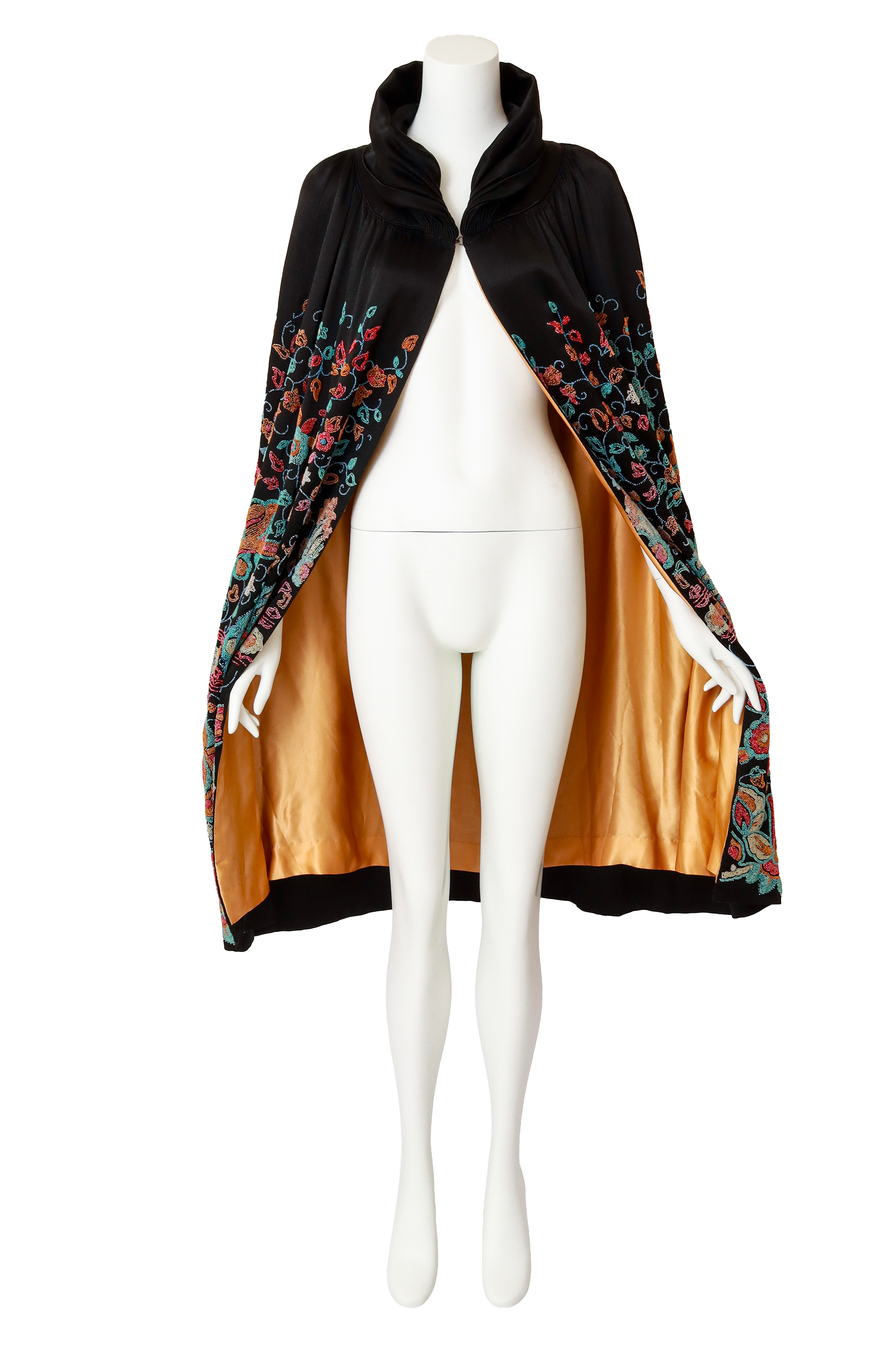 beaded floral cape on mannequin open @ Recess LA