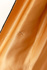 beaded floral cape tear to lining @ Recess LA