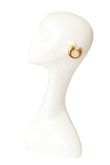 Hammered U hoop earrings by Alexis Lahellec on mannequin @ Recess LA