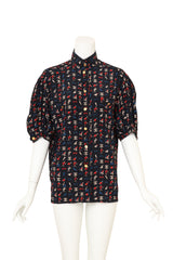 Vintage Chanel Novelty Logo Print Puff Sleeve Blouse on mannequin @ Recess LA