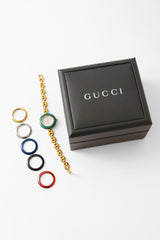 Watch and bezel box set by Gucci next to box @ Recess LA