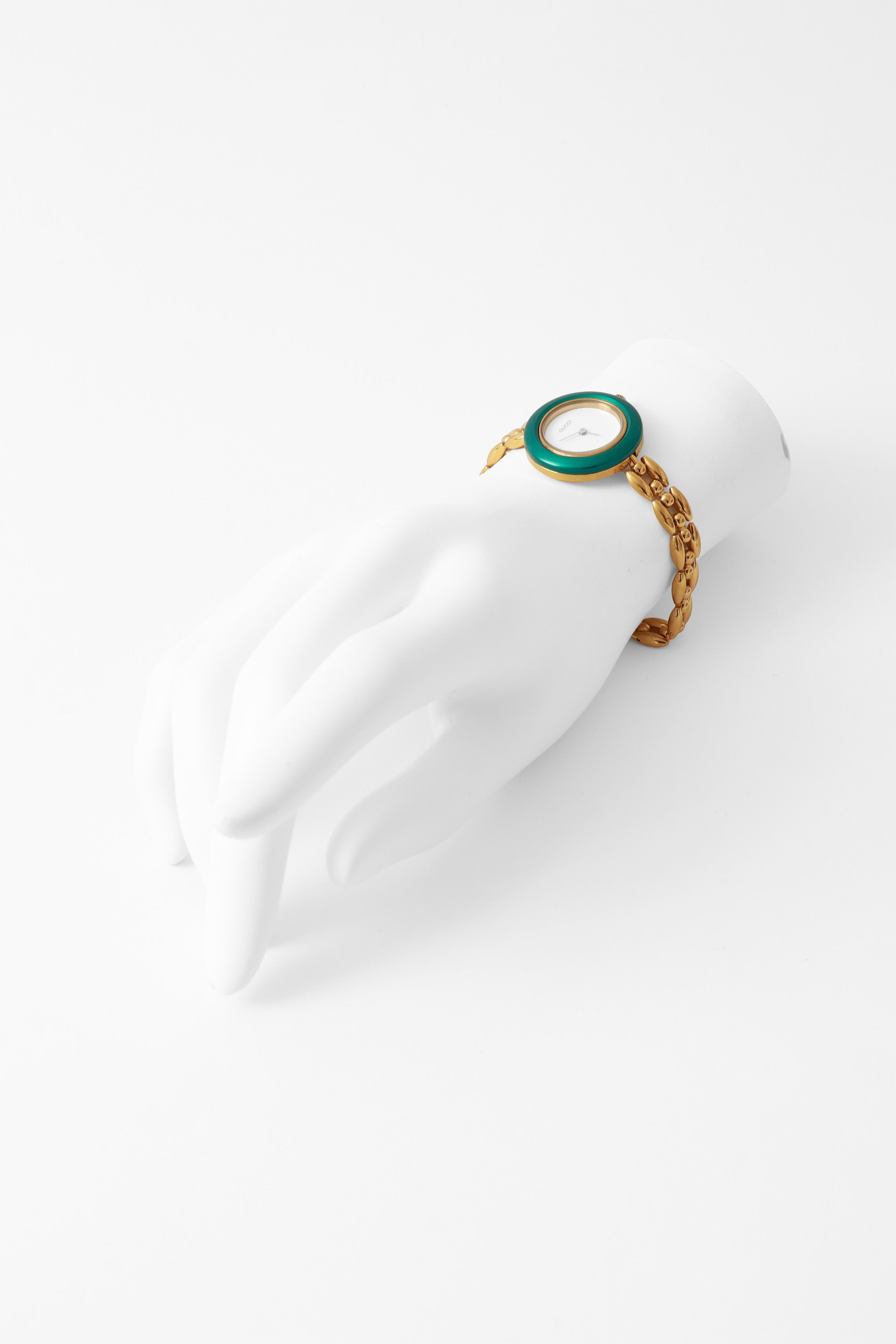 Watch and bezel set by Gucci on mannequin hand @ Recess LA