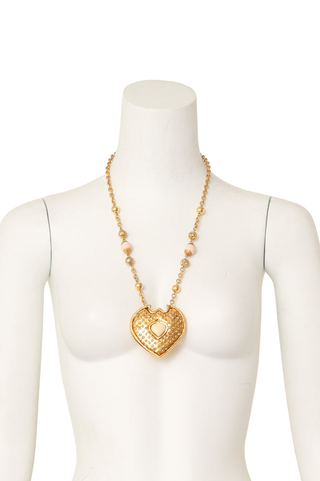 Heart shield pendant necklace on mannequin @ Recess LA