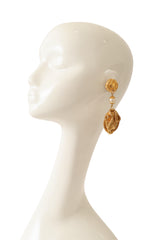 Snake and apple drop earrings on mannequin @ Recess LA 