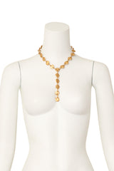 Hammered disc lariat by Biche de Bère on mannequin @ Recess LA