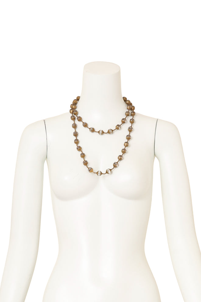 Unsigned Vintage Caged Glass Bead Sautoir Necklace layered on mannequin @ Recess LA