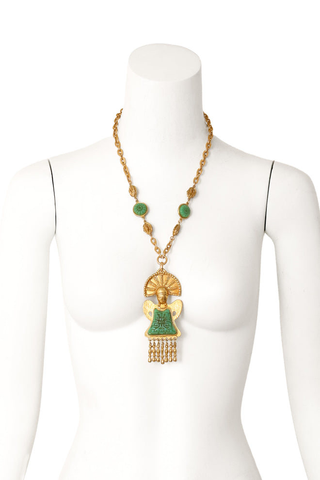 Golden Mayan carved enamel statement necklace on mannequin @ Recess LA 