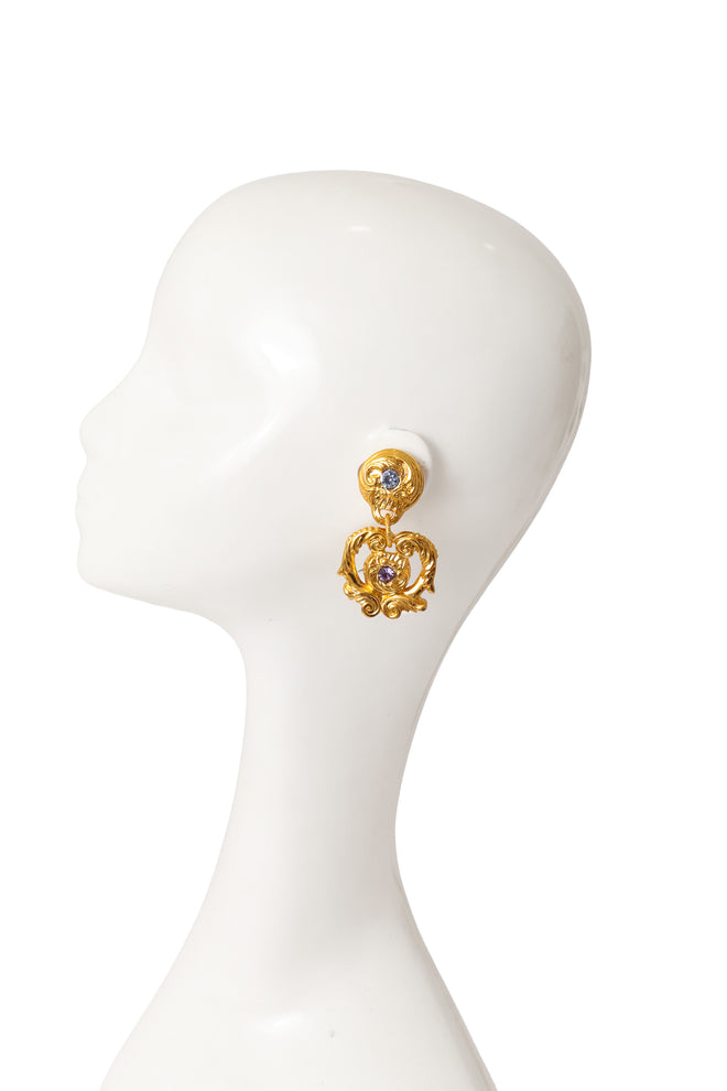 Golden flower filigree lavender crystal earrings by F. Volle on mannequin @ Recess LA 