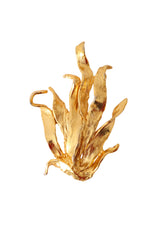 Golden sculptural flame brooch by Linda Hattab @ Recess LA 