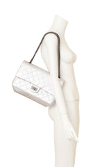 Chanel silver 227 Quilted Double Flap Bag on mannequin @ Recess LA