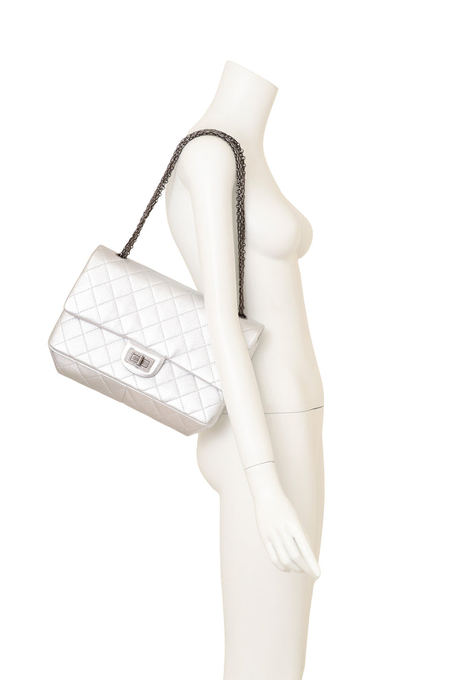 Chanel silver 227 Quilted Double Flap Bag on mannequin @ Recess LA