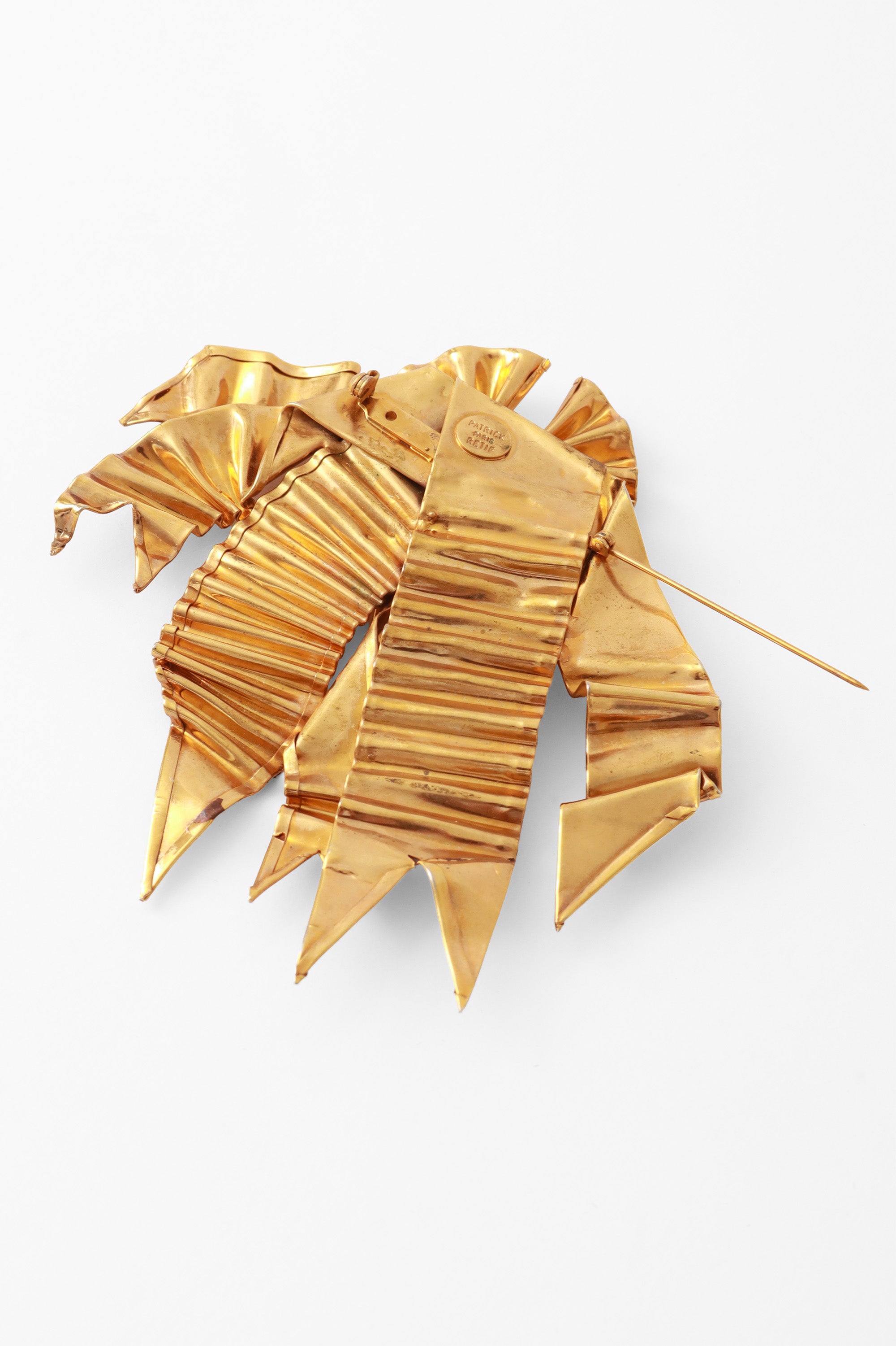 bow brooch by Patrick Retif back @ Recess LA