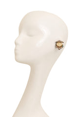 Smiling Buddha Bone Earrings by HAR on mannequin @ Recess LA