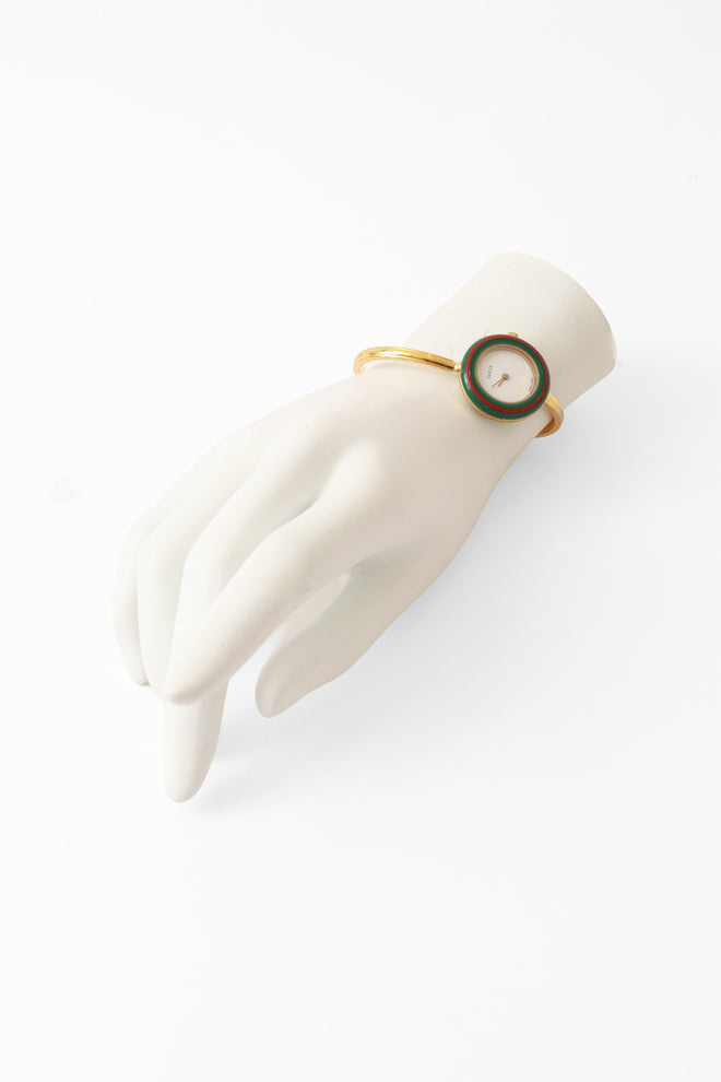 bezel watch set by Gucci on mannequin hand @ Recess LA