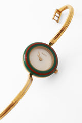 bezel watch set by Gucci face scratch @ Recess LA