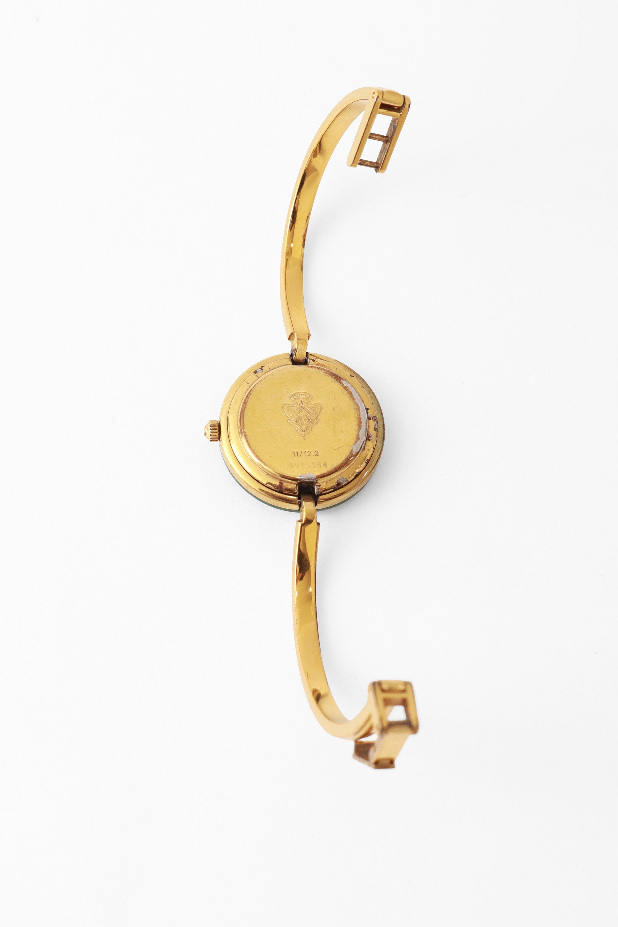 bezel watch set by Gucci back @ Recess LA