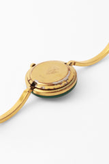 bezel watch set by Gucci scratches @ Recess LA