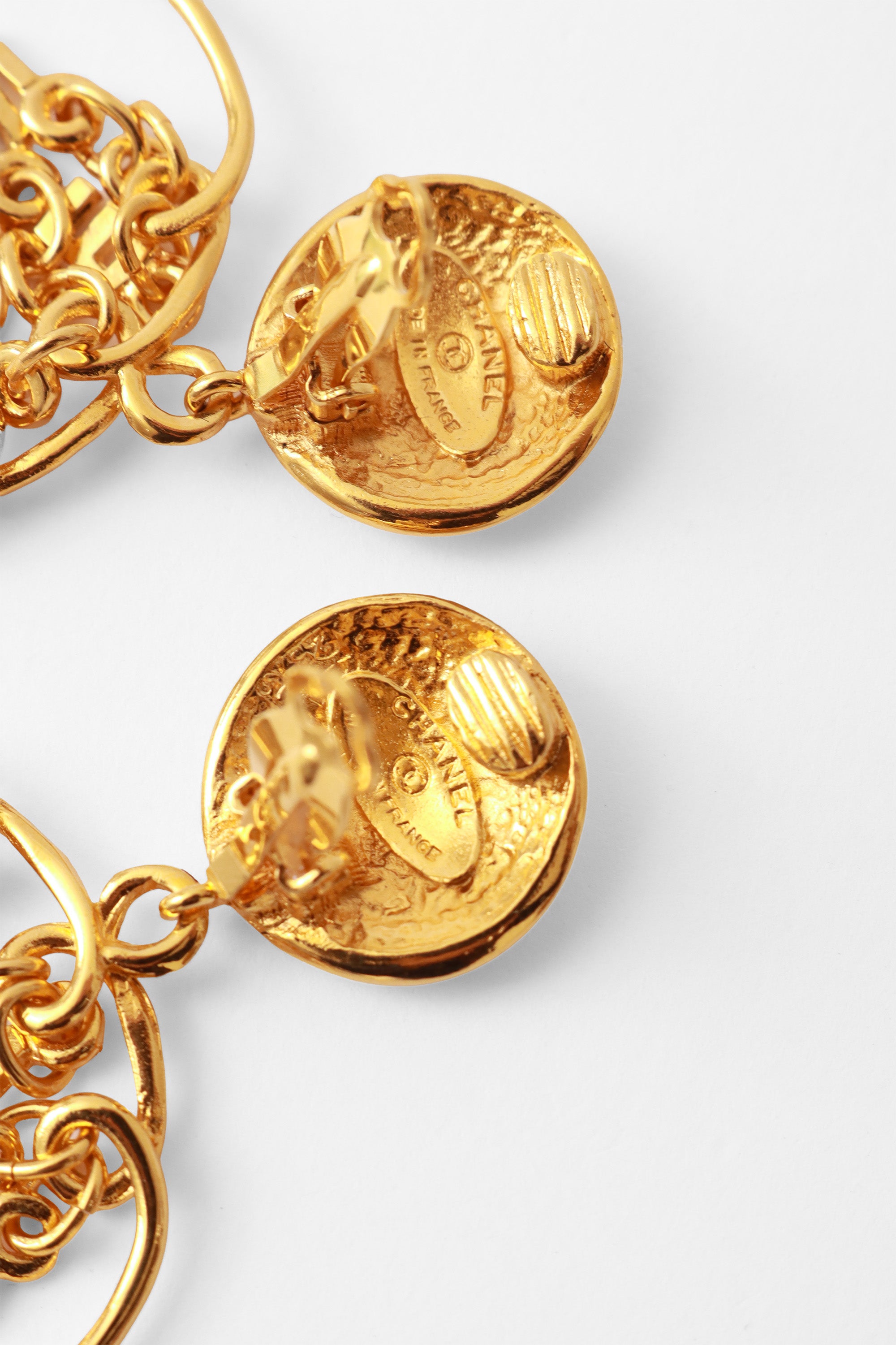 hoop earrings by Chanel cartouche @ Recess LA