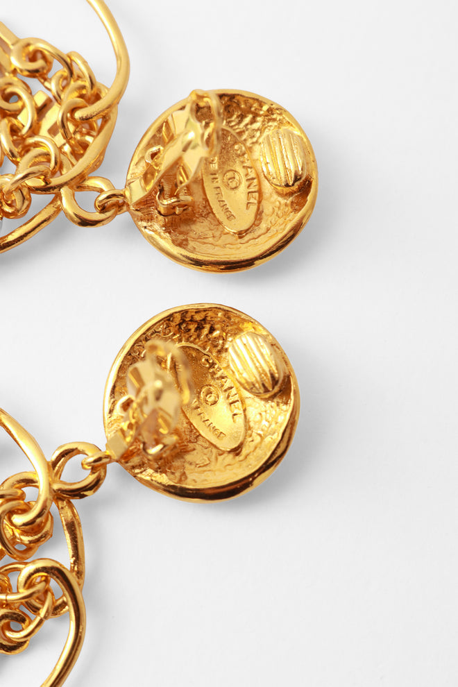 hoop earrings by Chanel cartouche @ Recess LA
