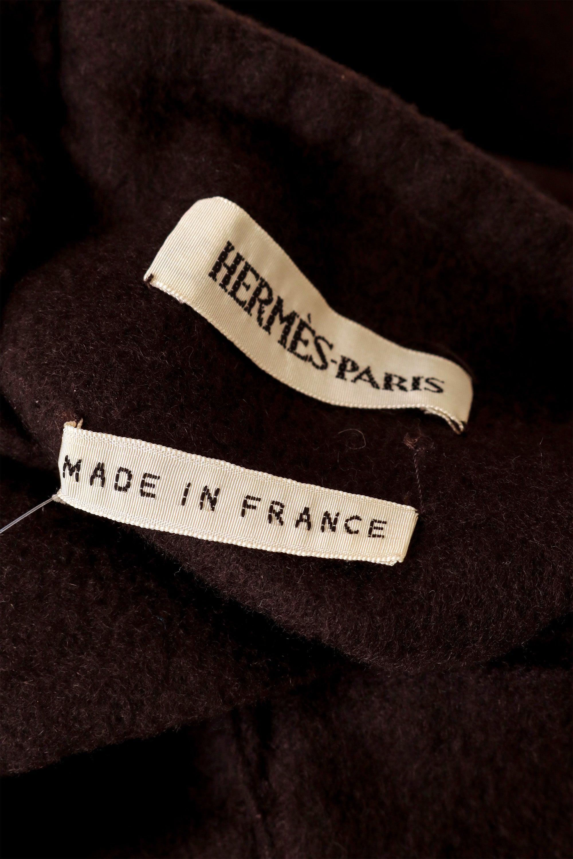 wrap coat by Hermès on mannequin label @ Recess LA