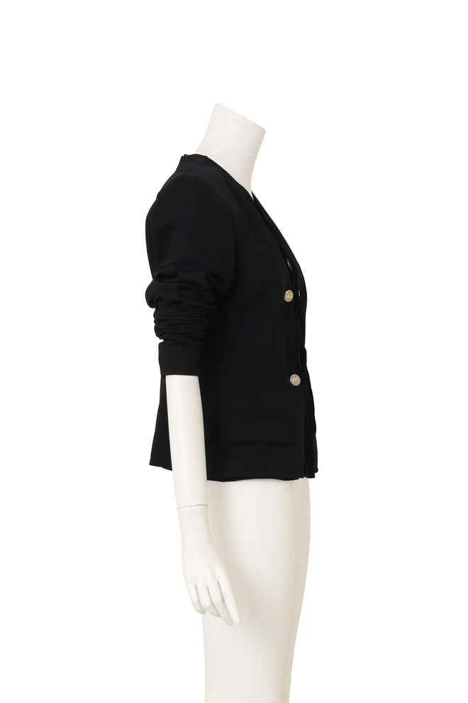 Cutout Coin Button Jacket by YSL on mannequin side @ Recess LA