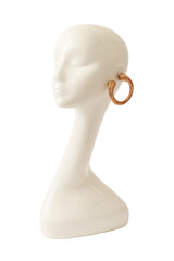 Large U earrings by Alexis Lahellec on mannequin @ Recess LA