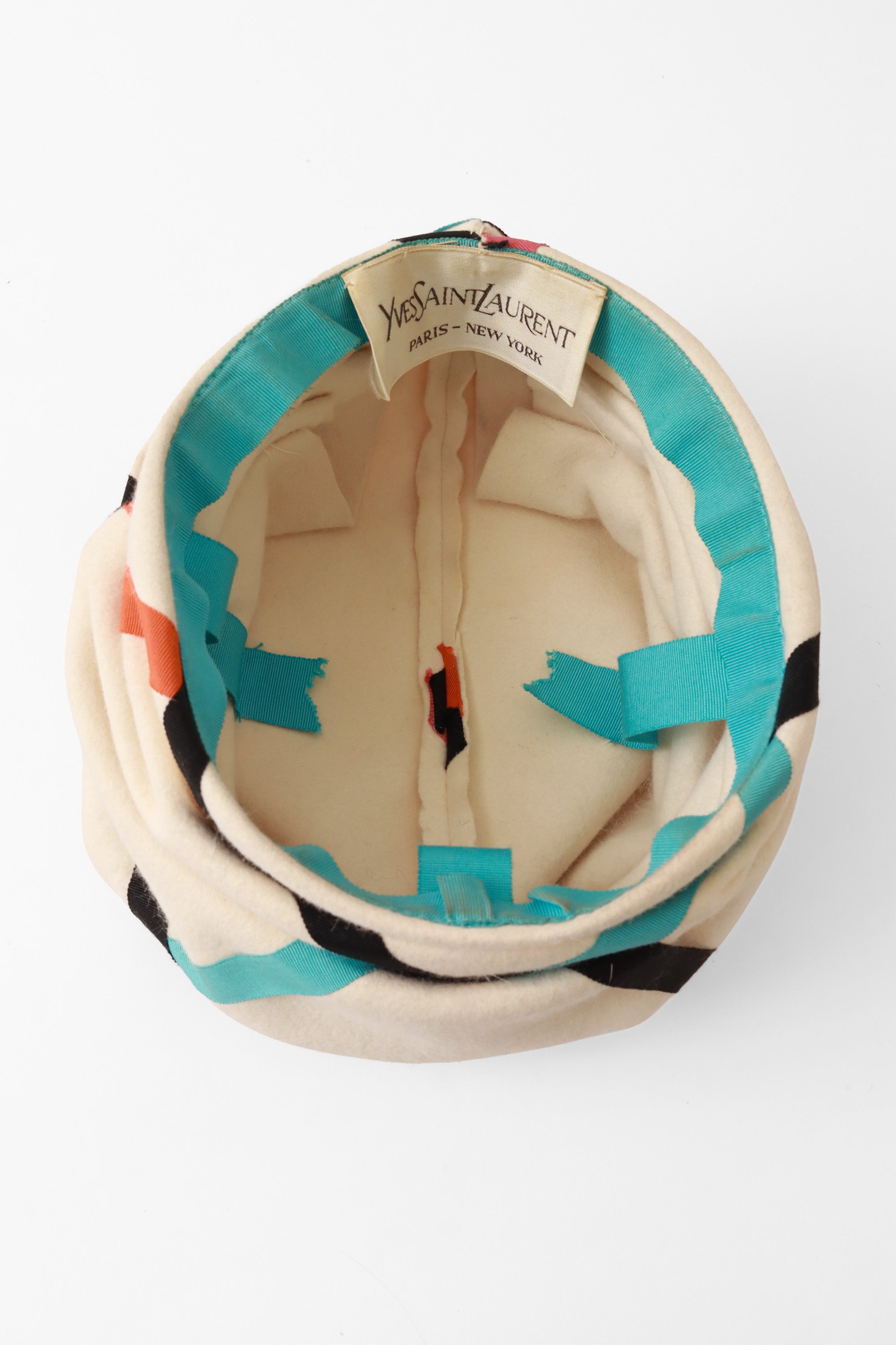 ribbon hat by Yves Saint Laurent inside @ Recess LA