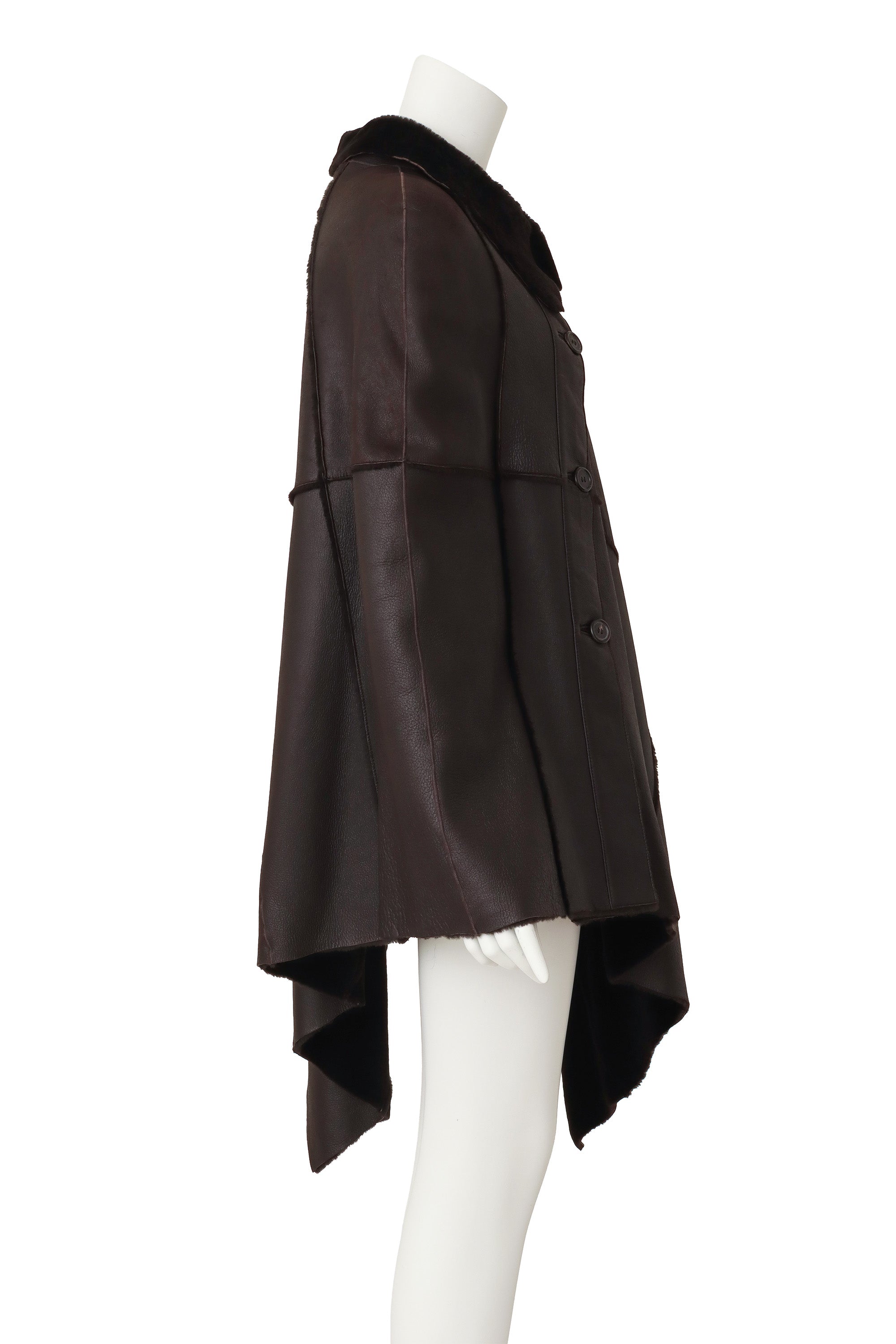 leather poncho by Michael Kors on mannequin side @ Recess LA