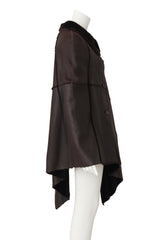 leather poncho by Michael Kors on mannequin side @ Recess LA