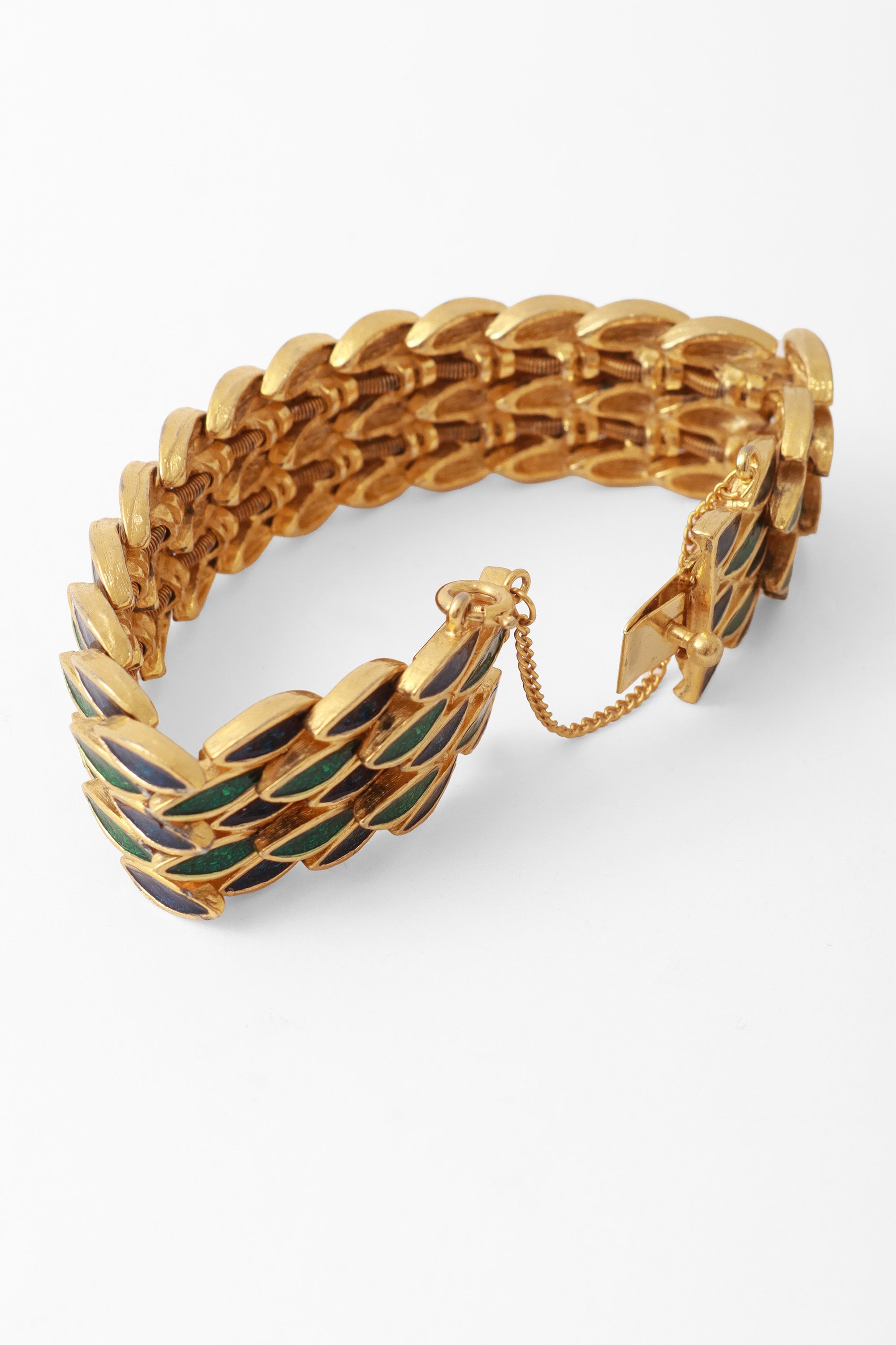 Gold bracelet with green and blue repeating leaf motif by DG closure close @ Recess LA